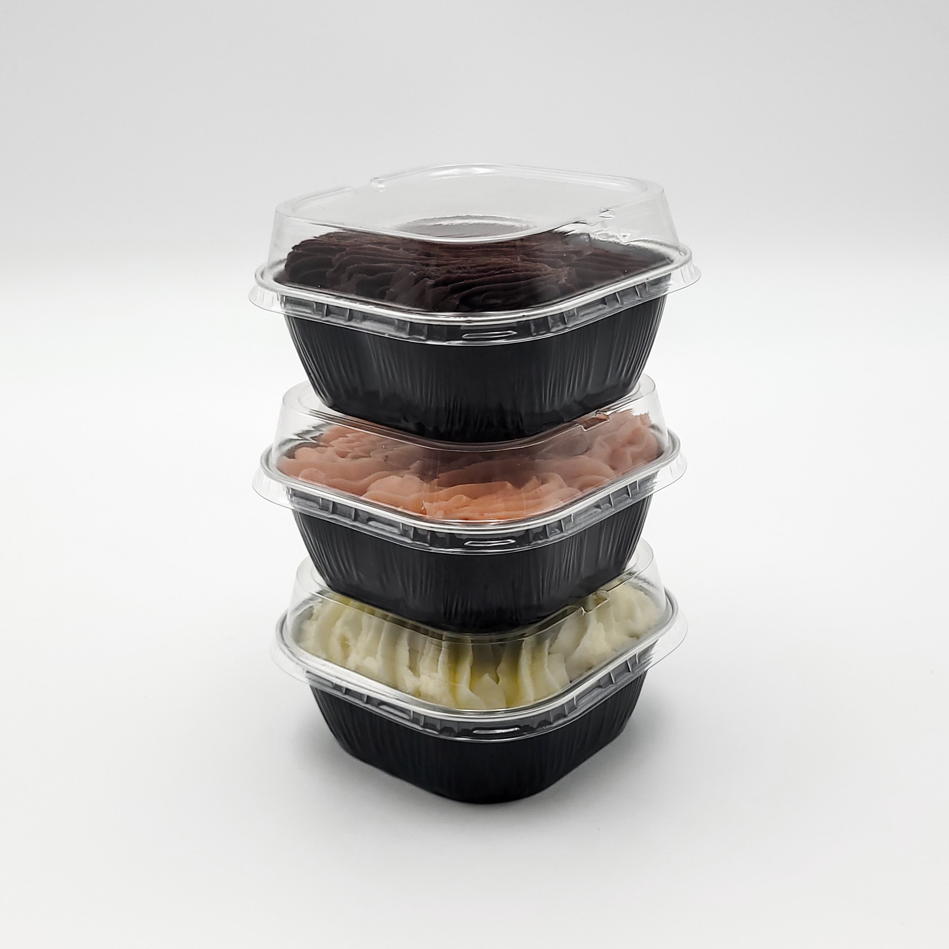 Stack of cutie cakes vanilla strawberry and chocolate