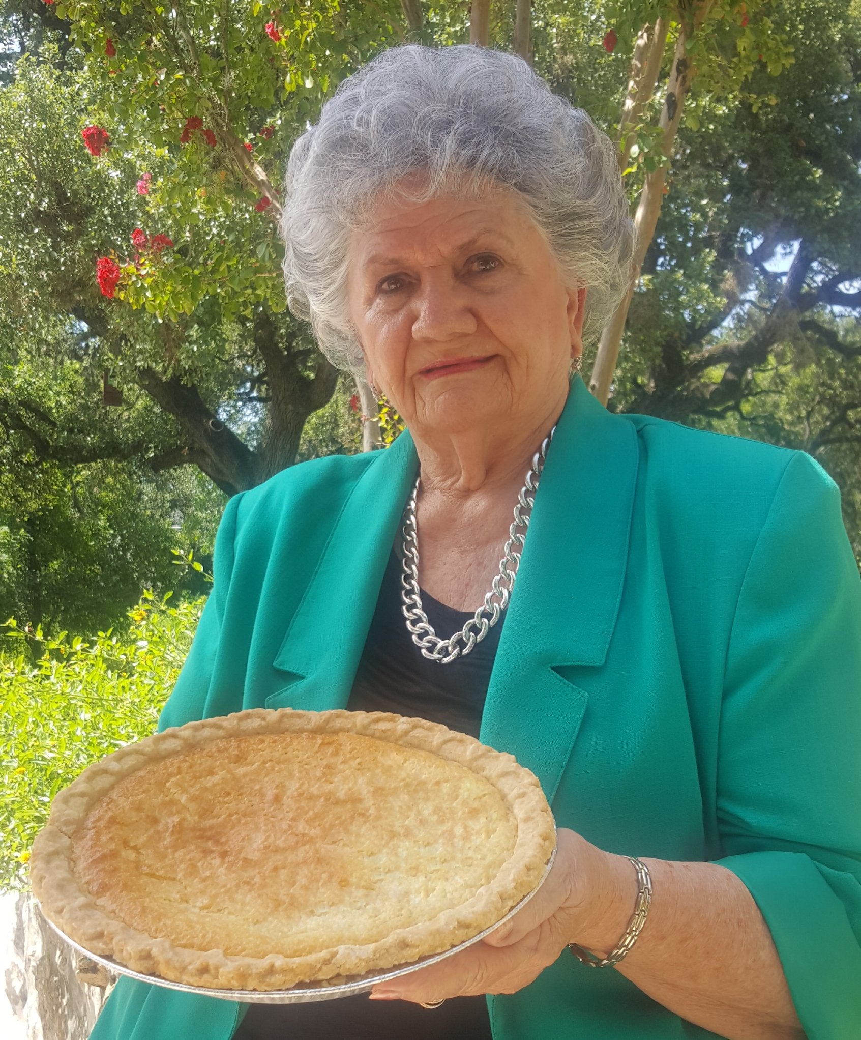 Miss Tootie holding a pie.